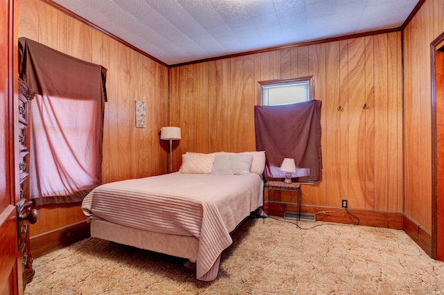12228 Indiana St, Leopold, IN 47551 - carpeted bedroom with visible vents, wood walls, and ornamental molding