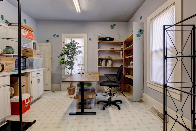 12228 Indiana St, Leopold, IN 47551 - home office with visible vents and light floors