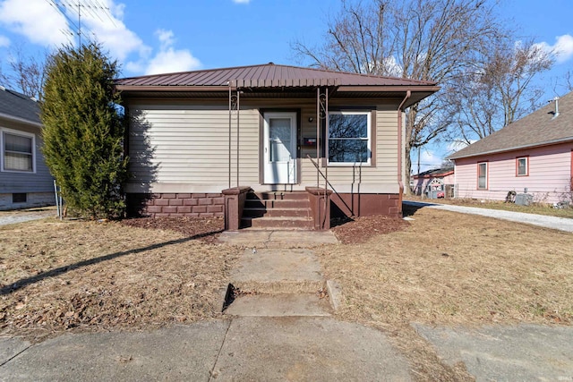 view of front of home with metal roof