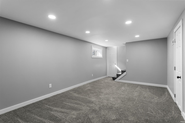 basement with stairs, recessed lighting, baseboards, and carpet floors