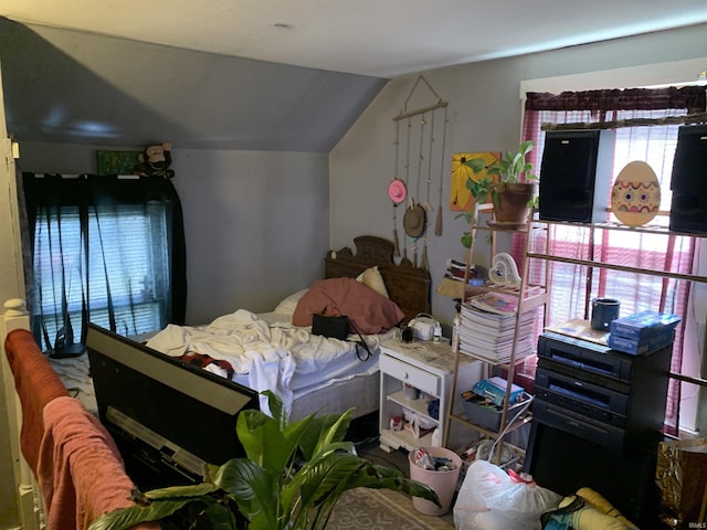 bedroom with vaulted ceiling