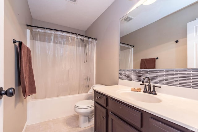 bathroom with vanity, toilet, shower / bath combo, and visible vents