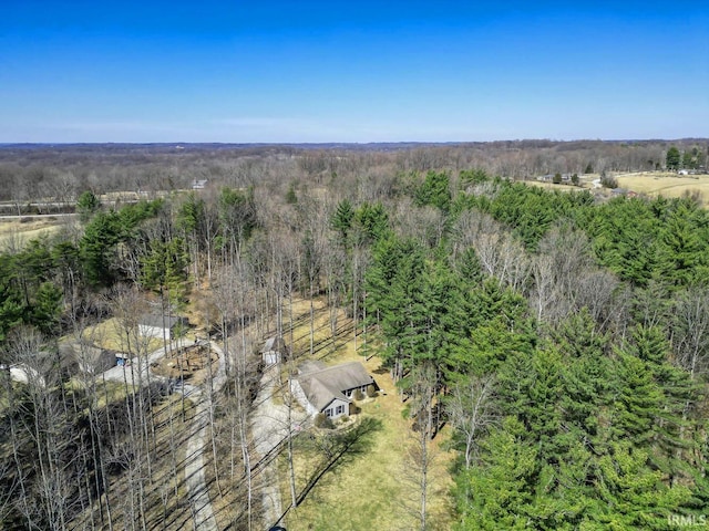 aerial view featuring a view of trees