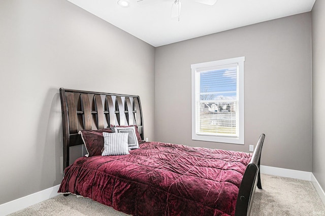 bedroom with baseboards, carpet, and ceiling fan