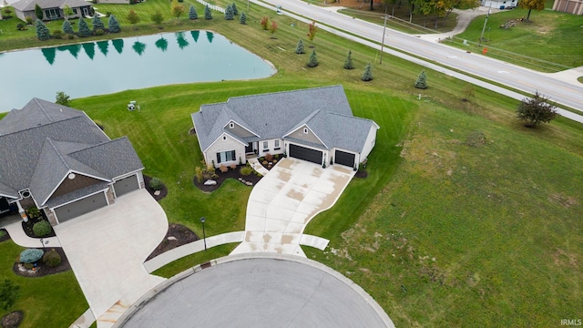 bird's eye view with a water view