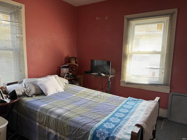 bedroom featuring carpet flooring