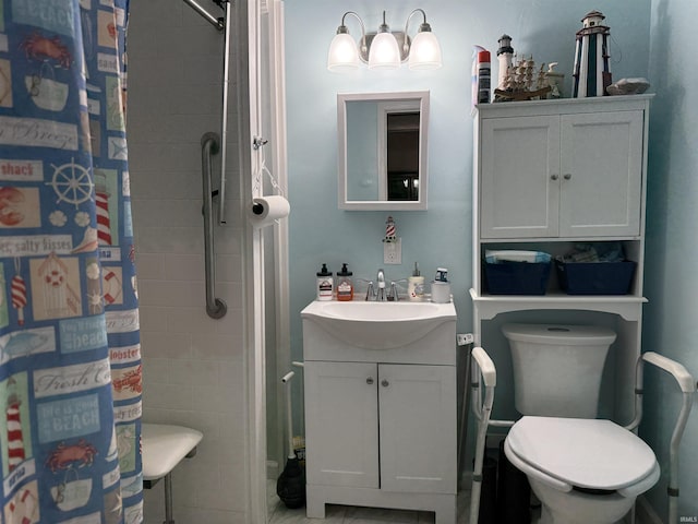 bathroom with vanity, toilet, and a shower with curtain