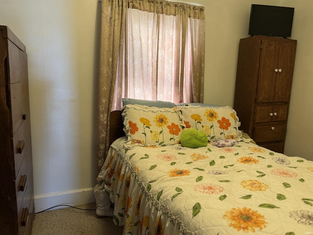 bedroom with baseboards