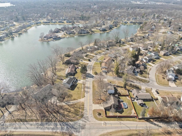 bird's eye view featuring a water view and a residential view