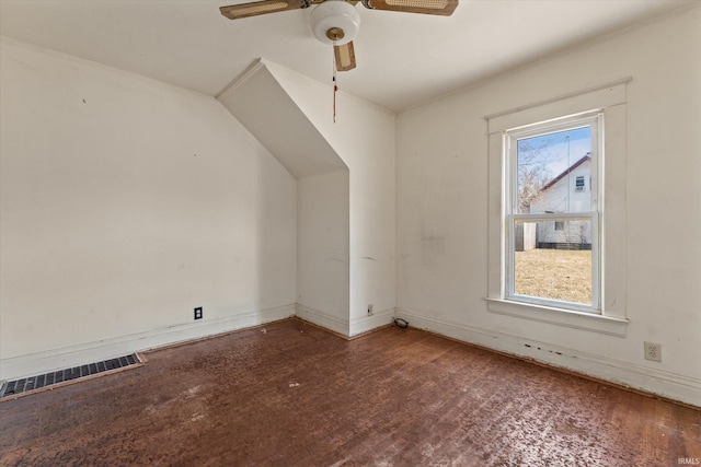 bonus room with visible vents, a healthy amount of sunlight, a ceiling fan, and wood finished floors