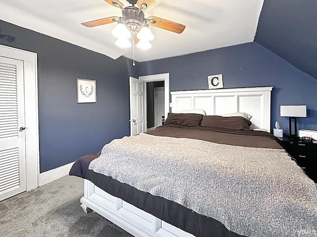 bedroom with carpet, ceiling fan, and vaulted ceiling