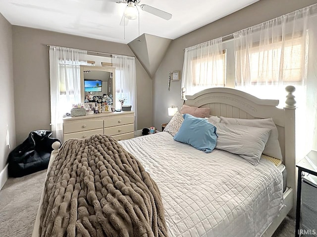 bedroom with ceiling fan and carpet floors