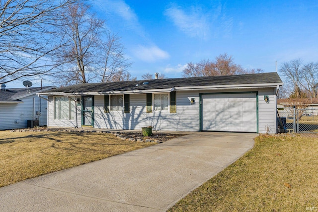 ranch-style house with a front lawn, fence, central AC unit, driveway, and an attached garage