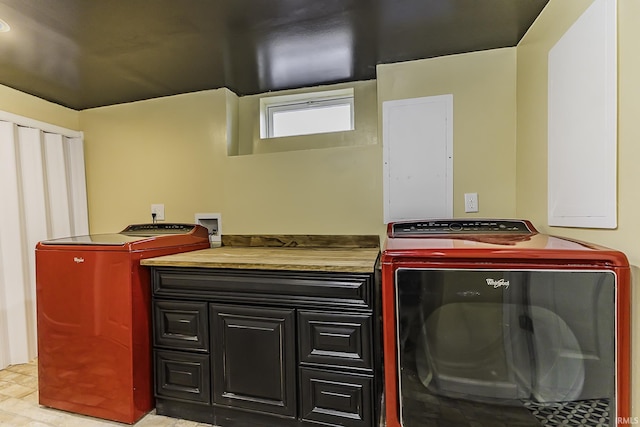 laundry room with laundry area and separate washer and dryer