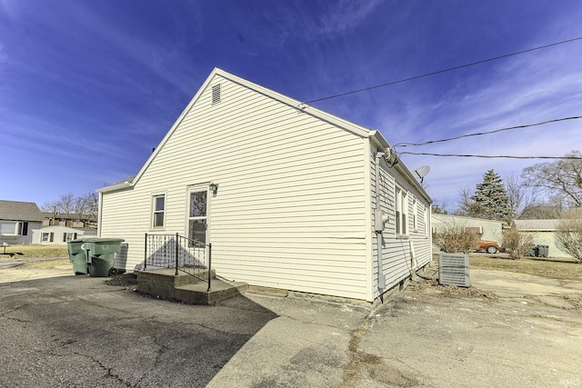 exterior space featuring central AC unit