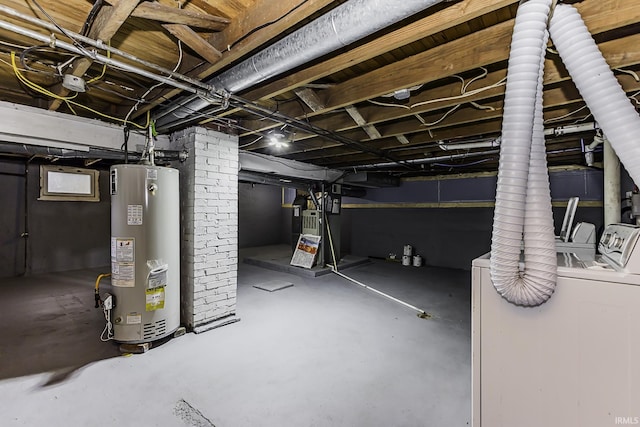 unfinished basement with water heater and washing machine and dryer