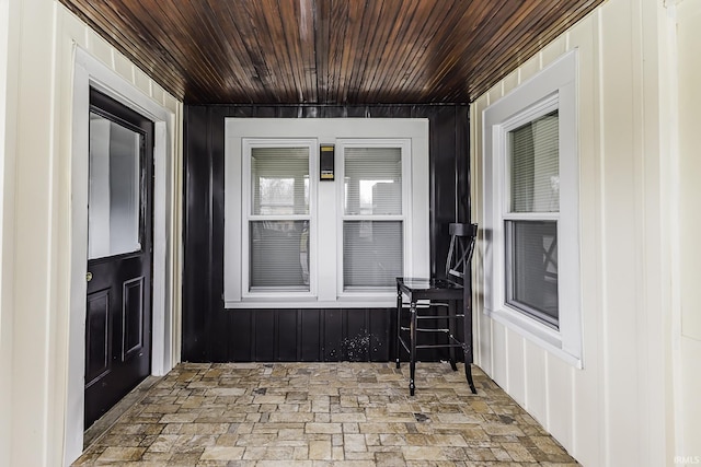 sunroom with wooden ceiling