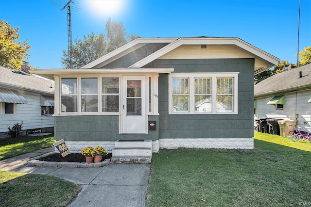 view of front of house featuring a front yard and entry steps