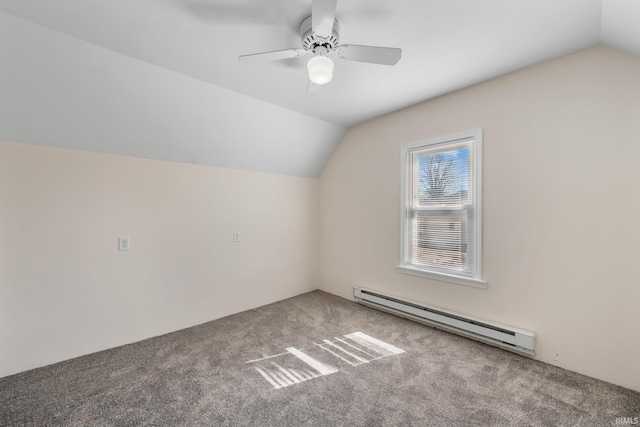 additional living space with carpet floors, a ceiling fan, lofted ceiling, and a baseboard radiator