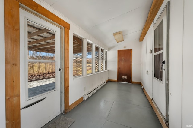 interior space with vaulted ceiling and a baseboard radiator