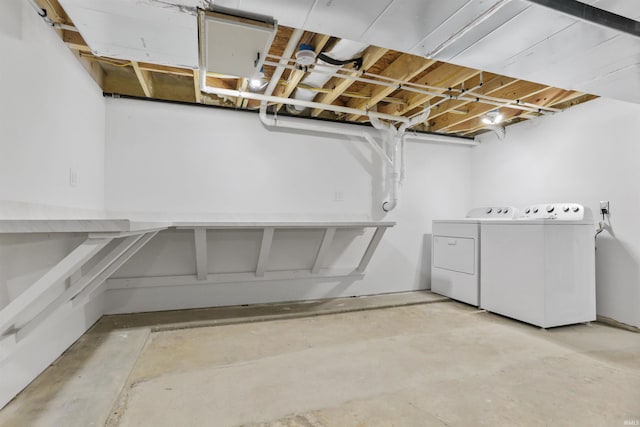 interior space with washing machine and clothes dryer