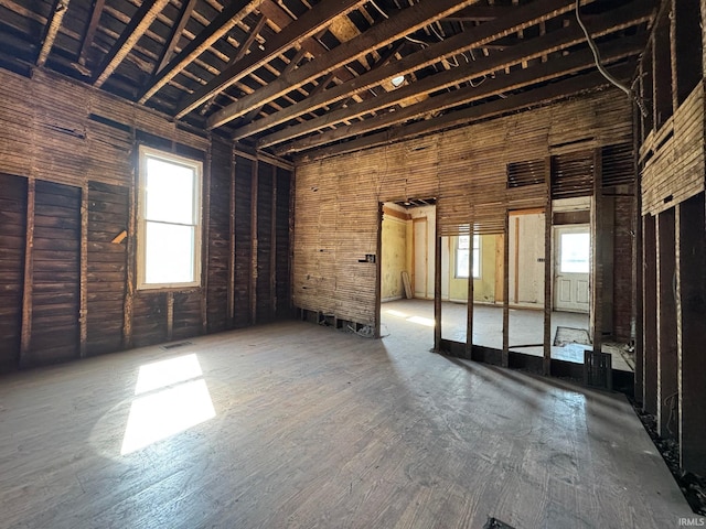 interior space with visible vents and a towering ceiling