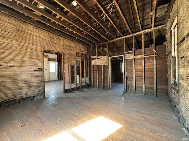 miscellaneous room featuring a towering ceiling