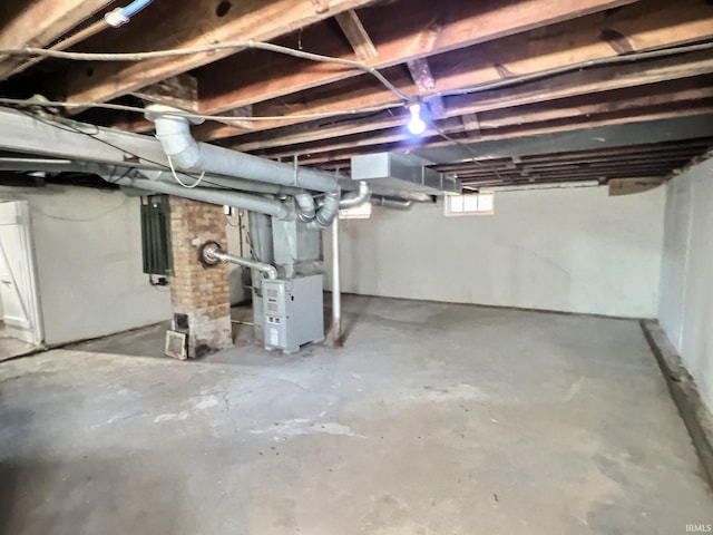 basement featuring heating unit