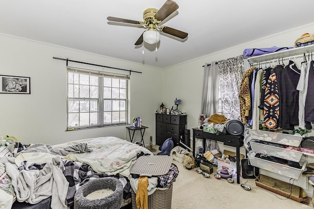 bedroom with ceiling fan and carpet