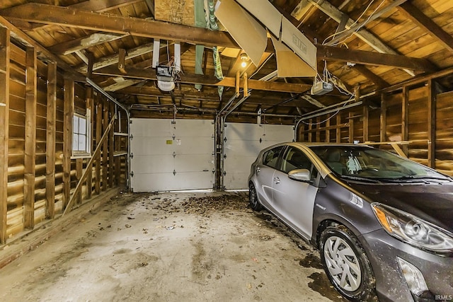 garage featuring a garage door opener