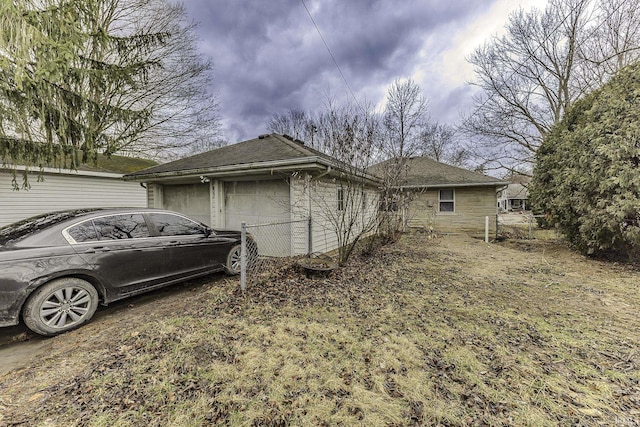 view of property exterior featuring a garage