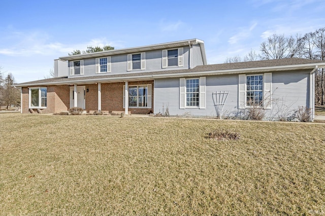 view of front facade featuring a porch and a front lawn