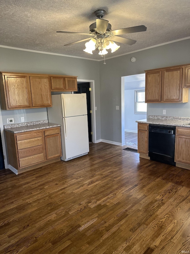 kitchen with dark wood-style floors, dishwasher, freestanding refrigerator, and crown molding