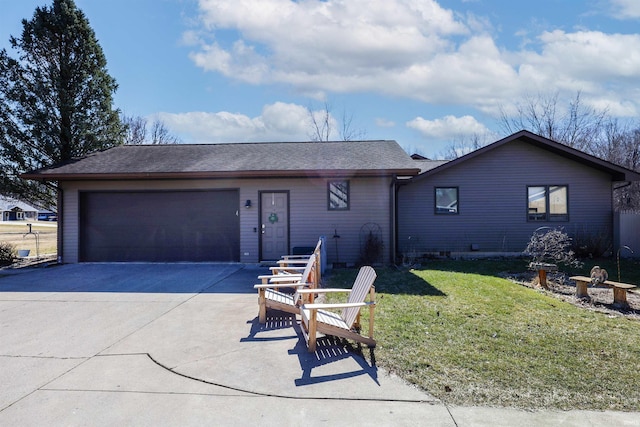 view of front of home featuring a front lawn, concrete driveway, a garage, and roof with shingles