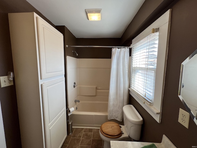 full bathroom with shower / bathtub combination with curtain, toilet, and tile patterned flooring