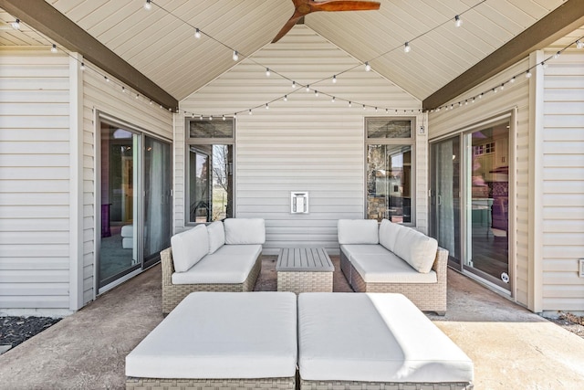 view of patio with an outdoor living space and a ceiling fan