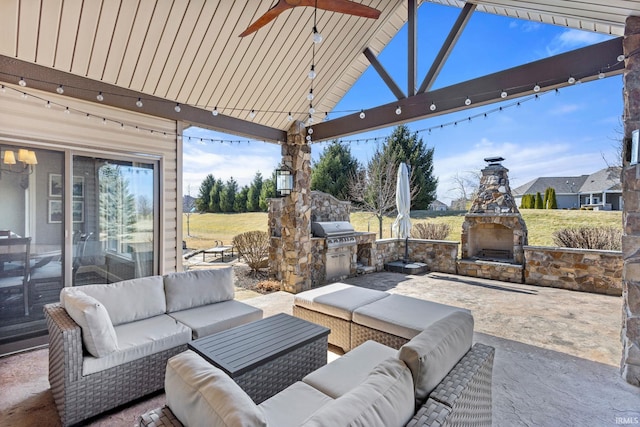 view of patio with an outdoor living space with a fireplace, exterior kitchen, ceiling fan, and area for grilling