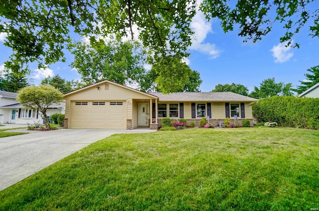 ranch-style house featuring a garage, a front yard, and driveway