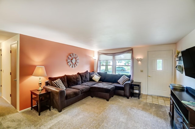 living room featuring light carpet