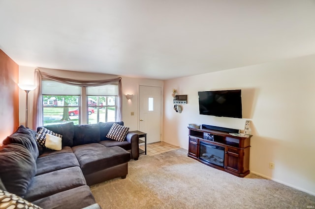 living area with light carpet