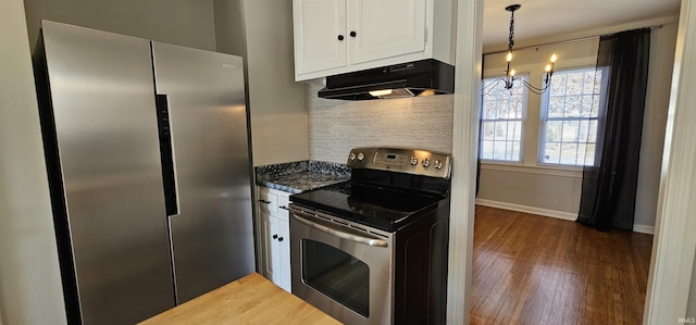 kitchen with wood finished floors, stainless steel appliances, decorative backsplash, white cabinets, and under cabinet range hood