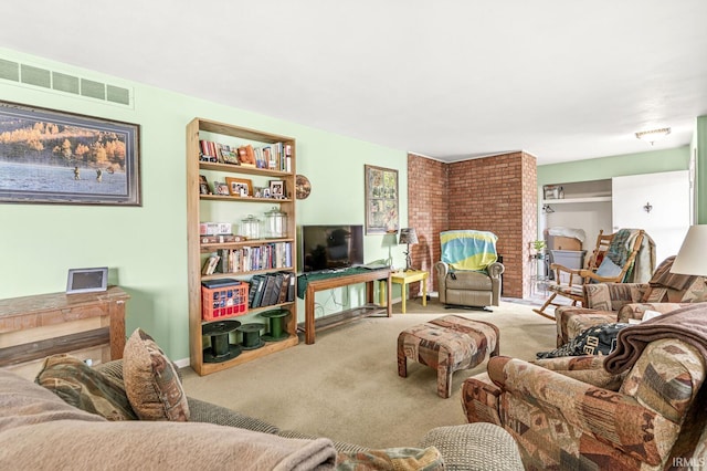 carpeted living area with visible vents