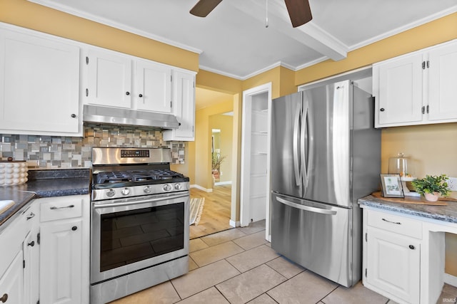 kitchen featuring a ceiling fan, stainless steel appliances, under cabinet range hood, white cabinetry, and crown molding