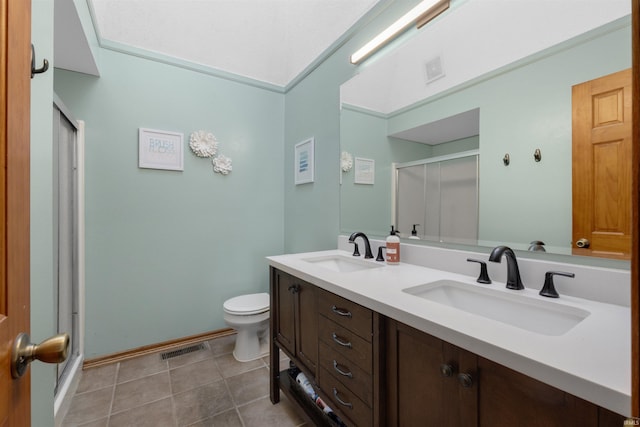 full bathroom featuring tile patterned floors, visible vents, a shower stall, and a sink