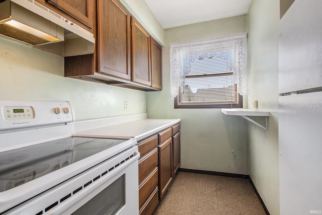 kitchen featuring under cabinet range hood, brown cabinetry, baseboards, and white electric range oven