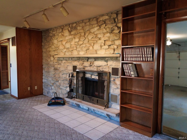 unfurnished living room featuring visible vents, a fireplace, and carpet floors