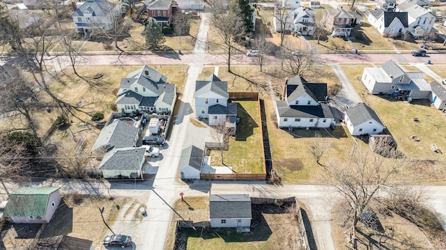 birds eye view of property with a residential view