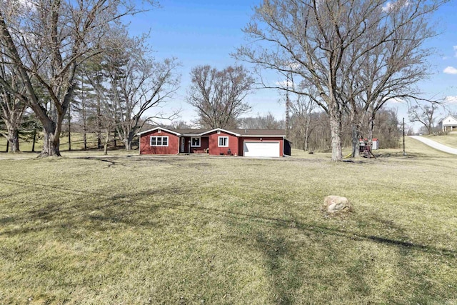 view of yard featuring a garage