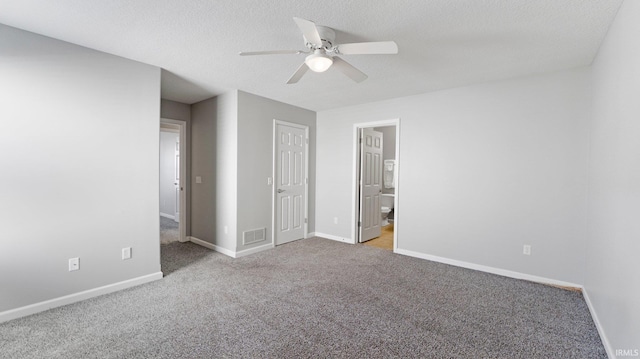 interior space featuring light carpet, baseboards, and ceiling fan