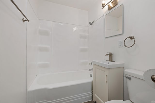 bathroom with shower / washtub combination, toilet, and vanity